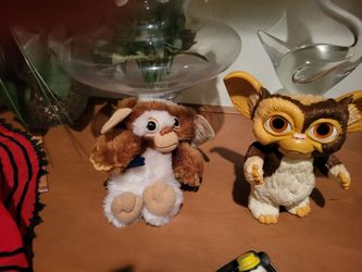 Gremlins, thick plastic, perfect, very old original ones, eighty dollars for the two piece set