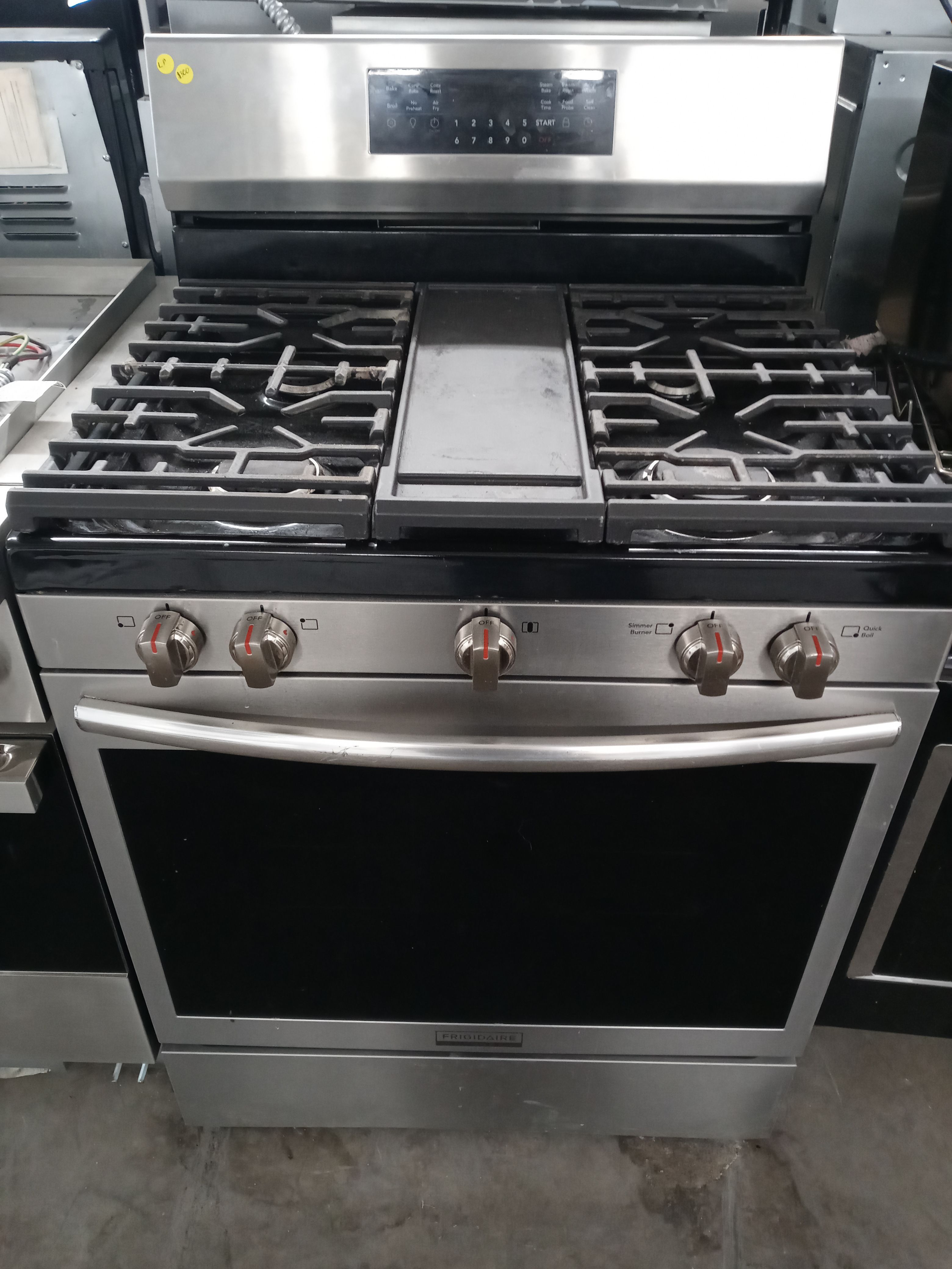 Frigidaire stainless steel 5-burner propane-converted stove - Free delivery