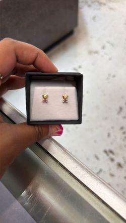 Very small bears with purple stone