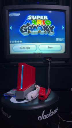 Loaded Nintendo Wii with lots of Wii and GameCube games included!