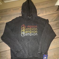 Champion Men's Stonewash Mineral Dye Retro Logo Graphic Hoodie in black.