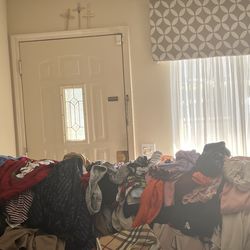 Woman’s size clothes there in good condition everything must go