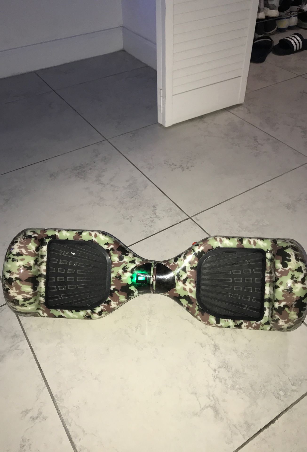 Camo Segway/ hoverboard with blue LED’s. Amazing condition. Charger included