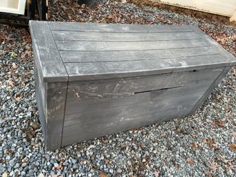 A strong plastic outside storage (46” long x 23” tall x 18” wide )