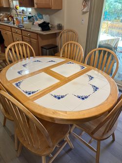 Kitchen table and 8 chairs