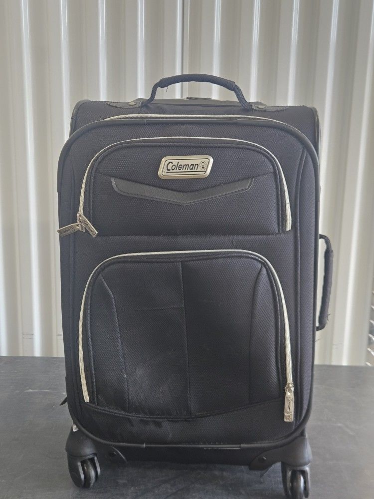 COLEMAN SOFT-SIDE (22 inch) ROLLING CARRY-ON SUITCASE 