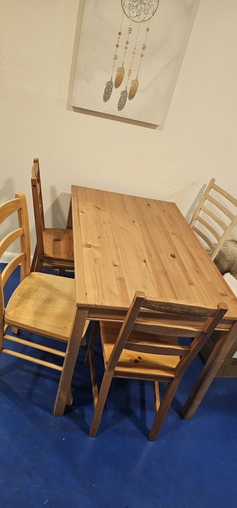 Solid Wood Table With Some Chairs