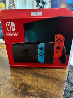Nintendo switch with extra controllers 3 games