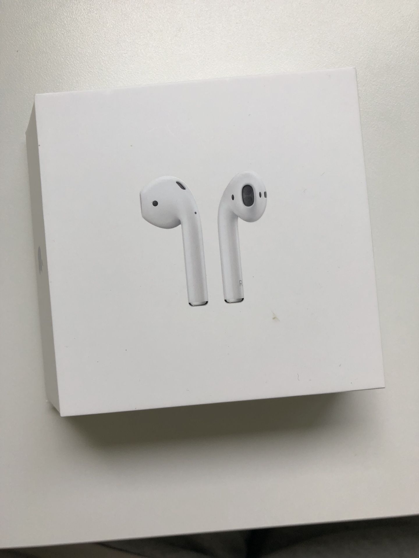 New Apple AirPods With Charging Case