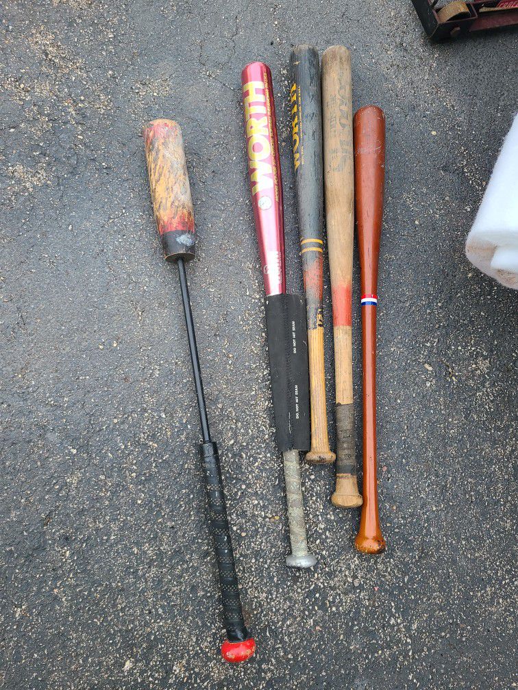 7 Baseball, Softball And Practice Bat $10 Each Or $30 For All Of Em.