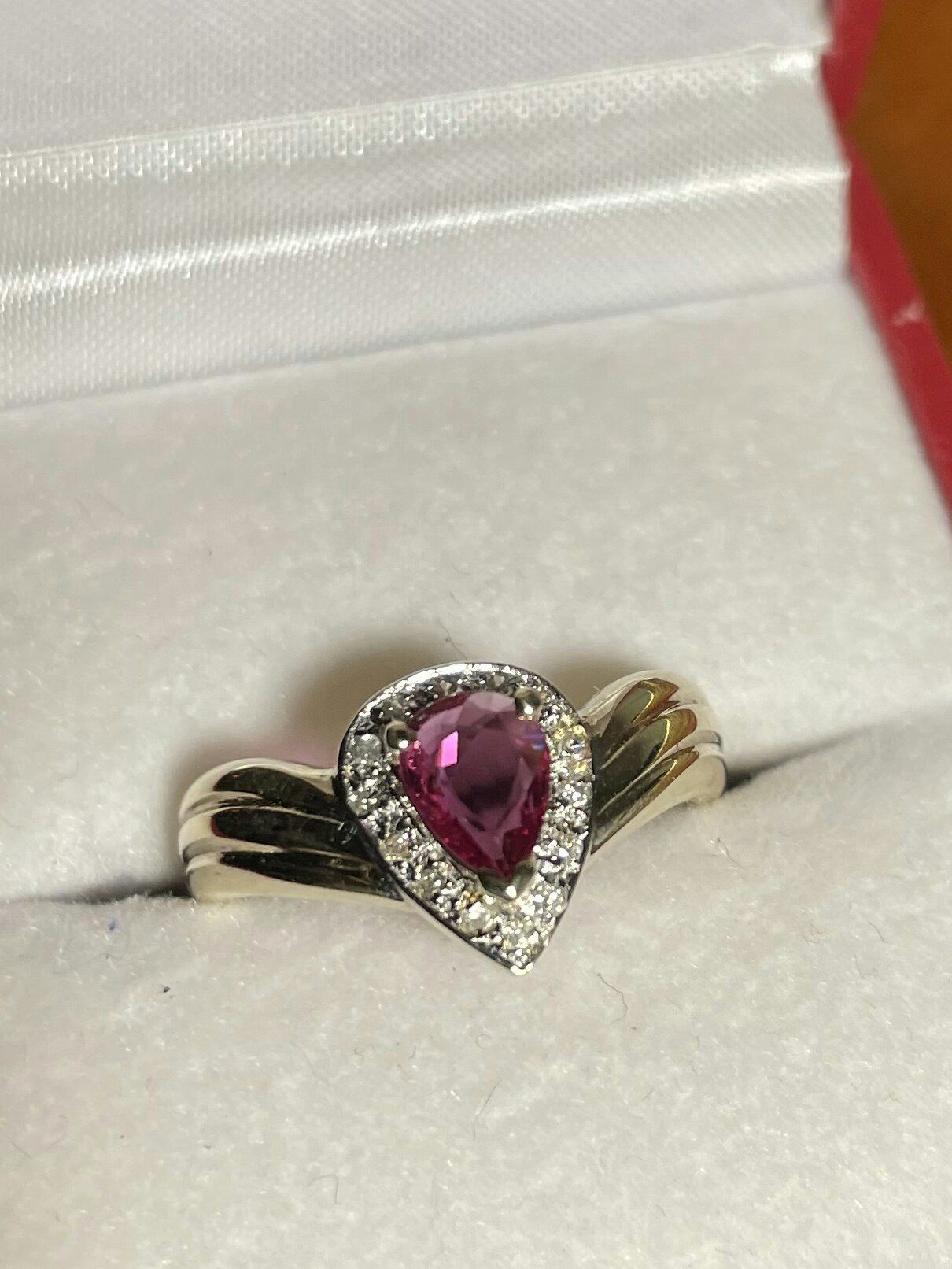 SOLITAIRE RUBY IN DIAMOND HALO SETTING 14KT GOLD