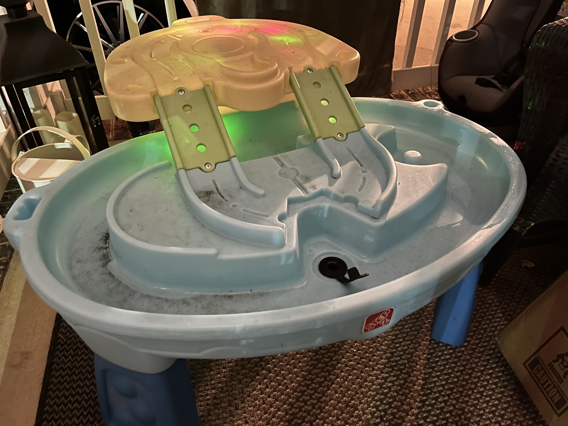 Step to play table and Graco car seat