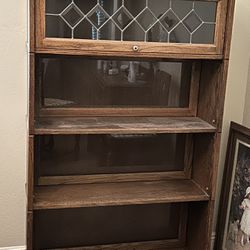 Bookcase with glass sliding doors