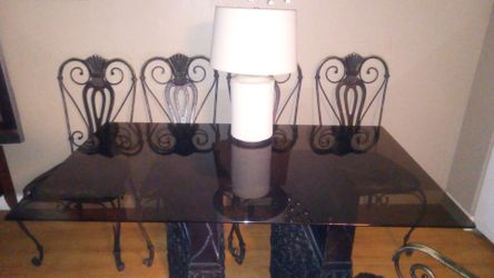 Glass top table and six chairs