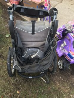 Booster seat, crib/toddler bed, jogging stroller, bike and toy motorcycle