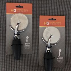 2 new in package hometown gourmet pizza cutters.