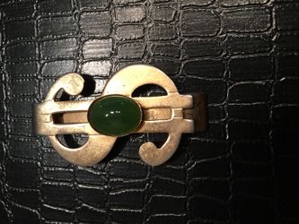 Dollar sign money clip with green stone