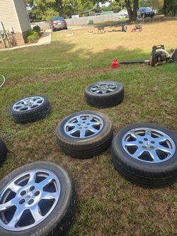 STS CADILLAC RIM AND TIRE
