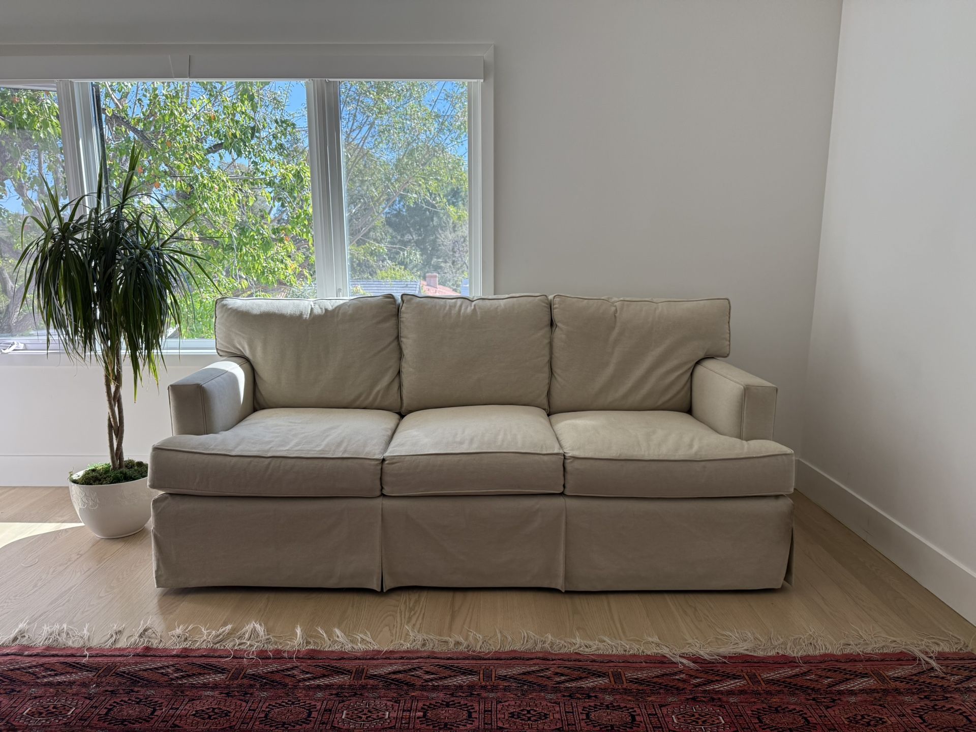 A Set Of Two Sofas