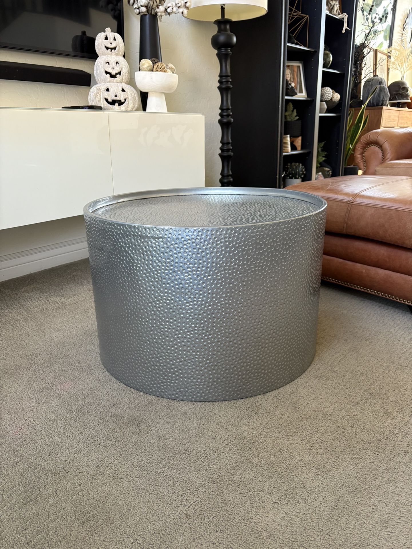 Modern Round Coffee Table with Hammered Iron