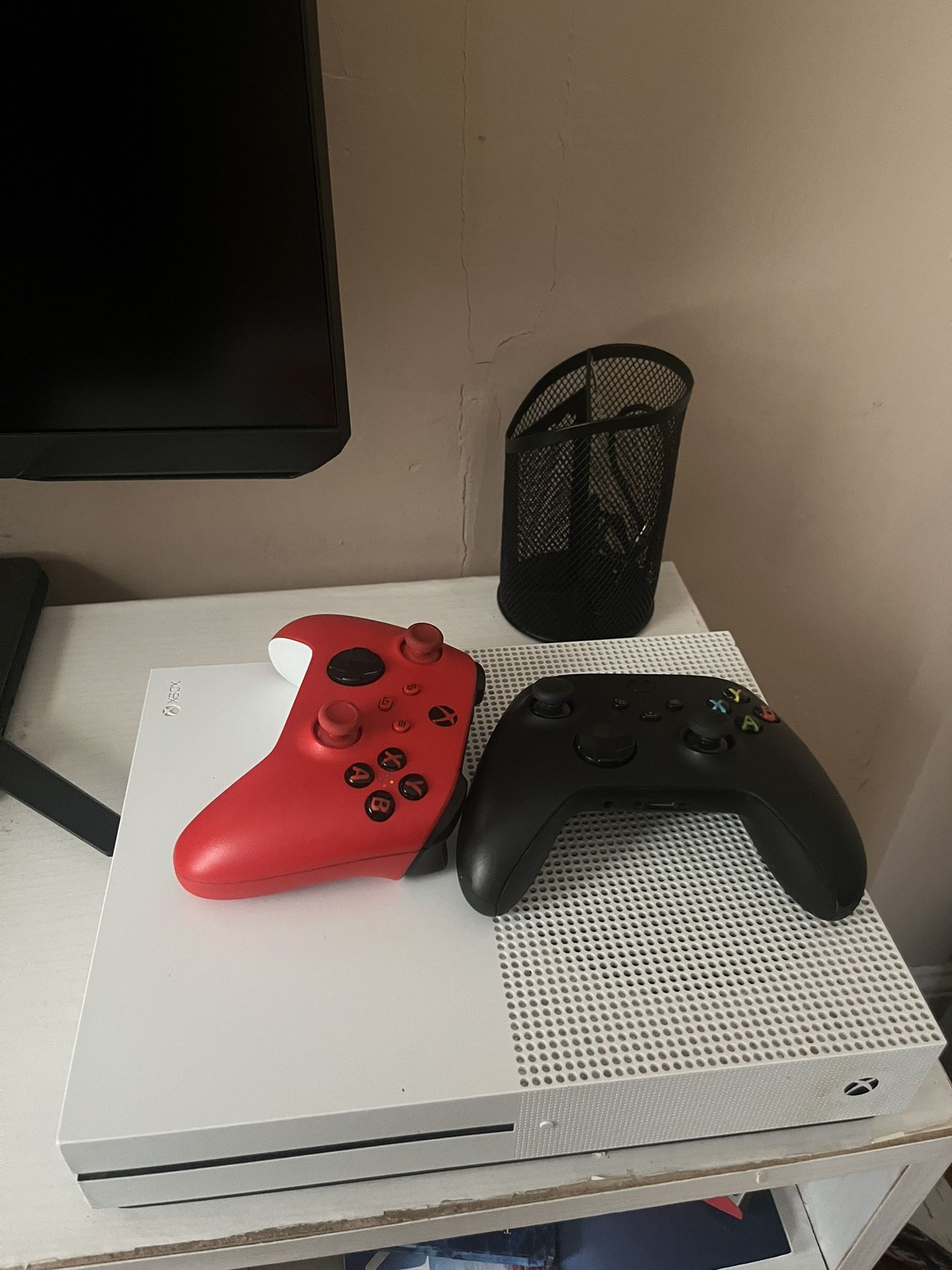 Xbox One S 500 gb with power cord, HDMI cable, , and 2 controllers.