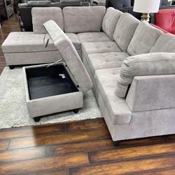 Grey Chenille Sectional Couch And Storage Ottoman