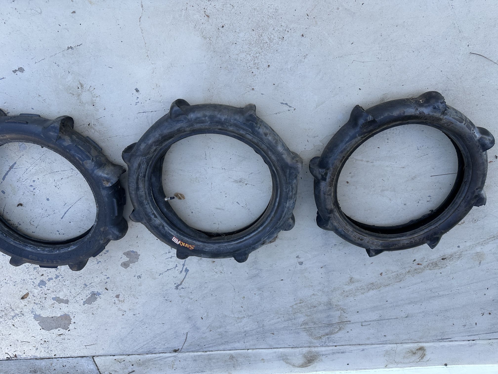 Three Dirt Bike Paddle Tires And Inner Tubes