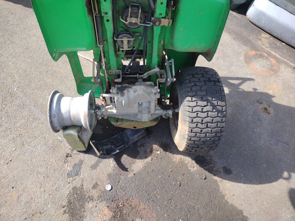 Land Mower Transmission And Hood