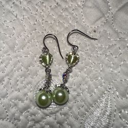 A pear-shaped green gemstone 