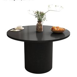 i have brand new chairs and table set black 