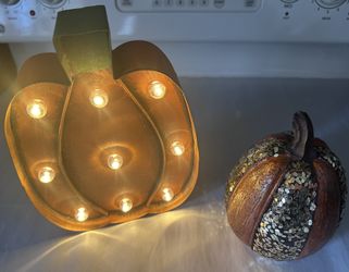 Lighted Pumpkin And Decorative Pumpkin