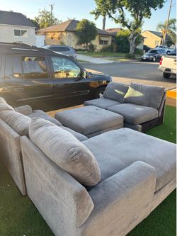 Grey living room sofa- used but still in good condition