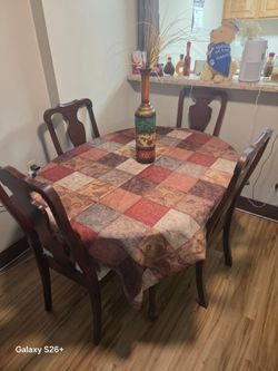 Adam Ethan.
Dining room table