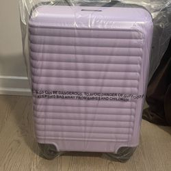 Travelhouse Hardshell Carry on  Suitcase with Spinner Wheels.