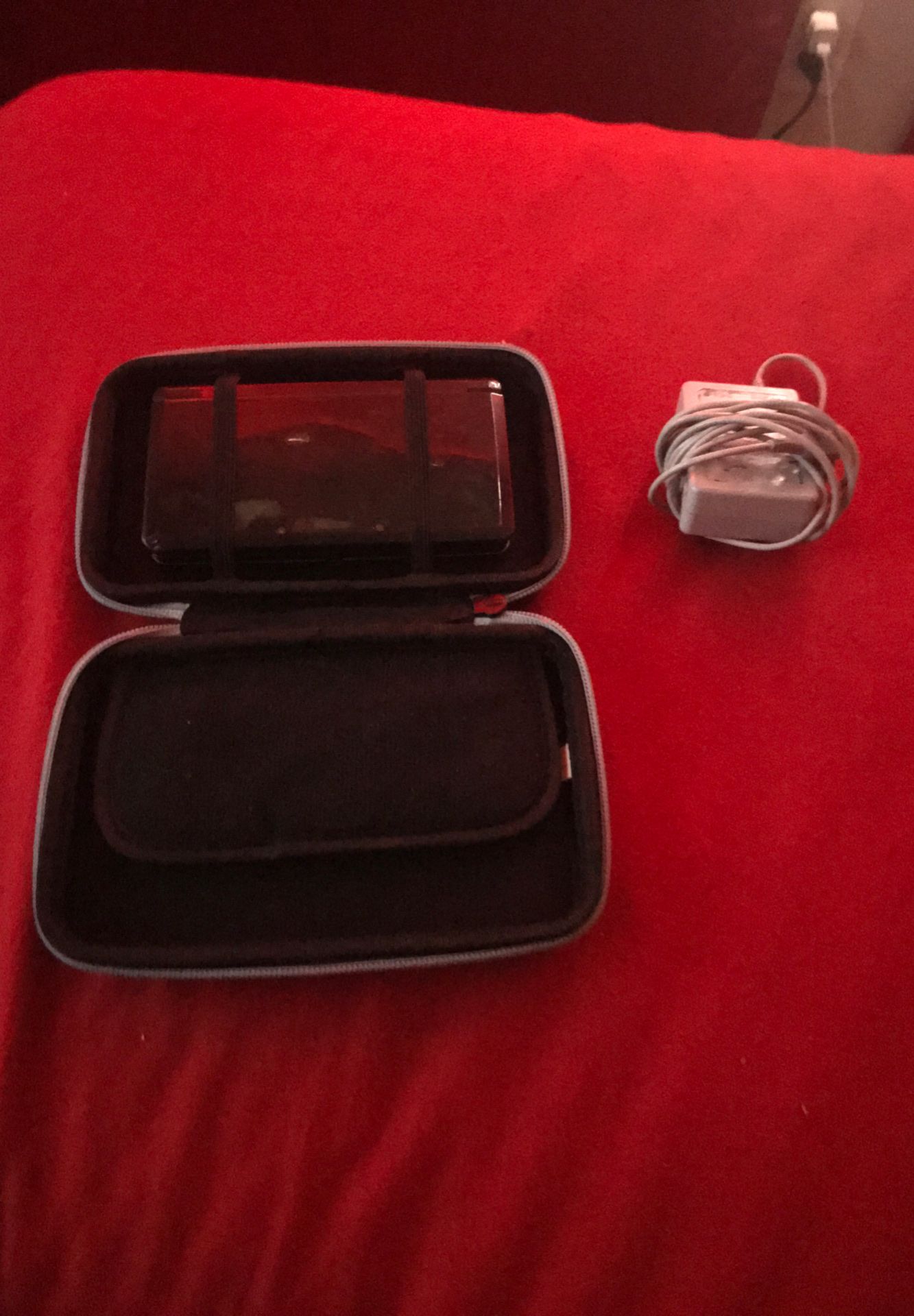 Nintendo 3DS with a case and charger (no games)