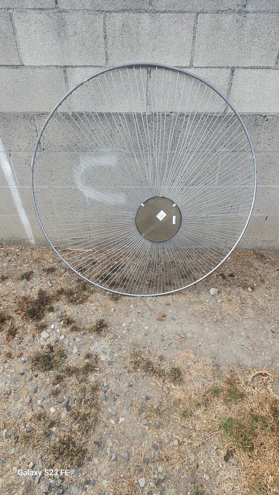 vintage Mid-Century Modern Brutalist metal sunburst wall sculpture.