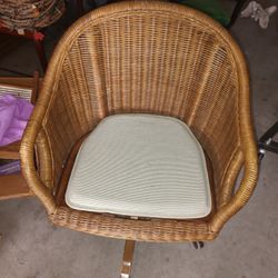 Rattan Rolling Desk Chair with adjustable height feature 