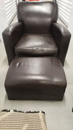 Brown leather chair and ottoman