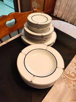 Dishes. Three plate sizes and bowls. Microwave and dishwasher safe . Twenty four pieces