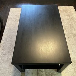 Black coffee table with self