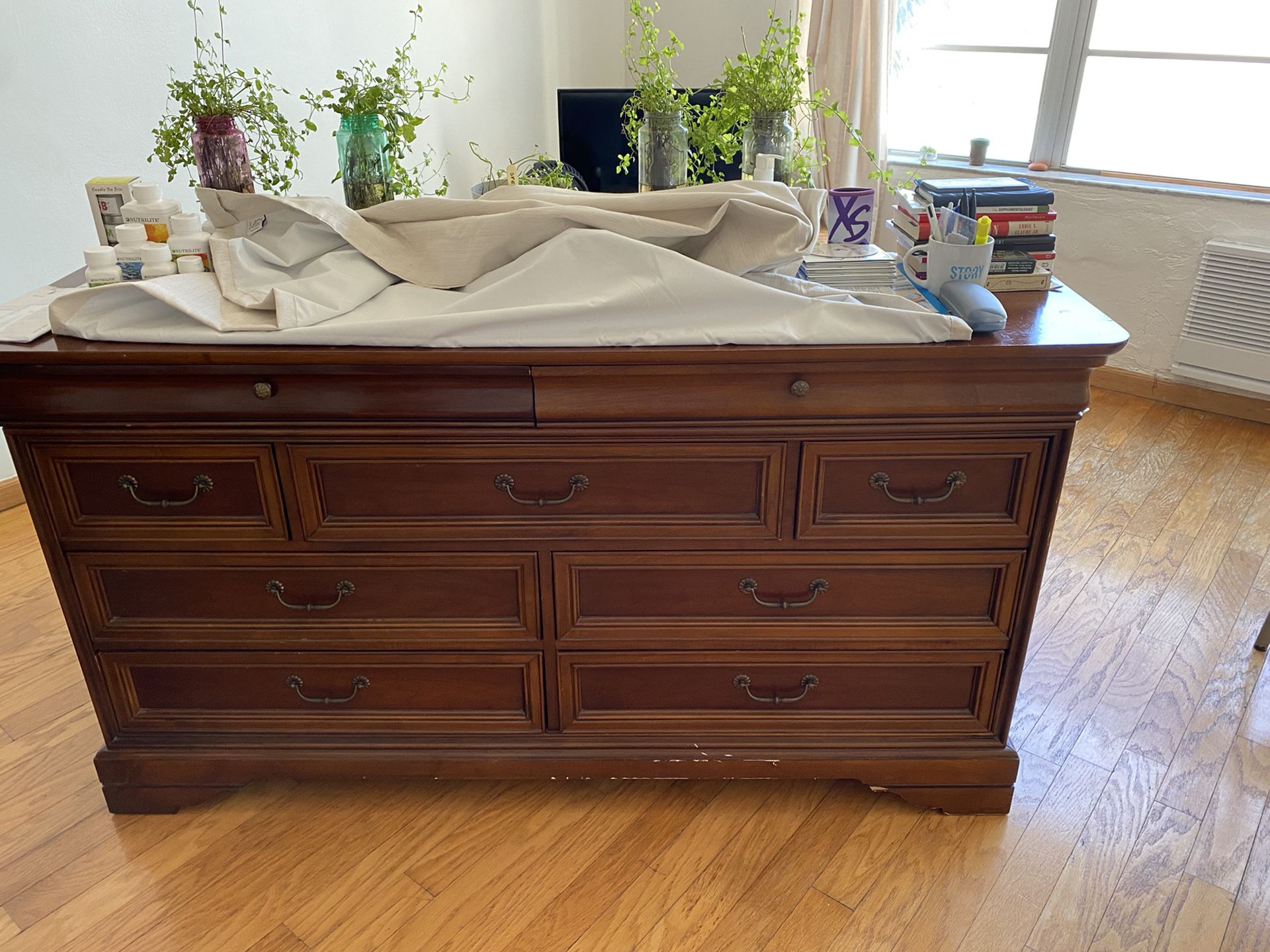 6 ft wide nice wooded dresser. Perfect for storage and in good condition