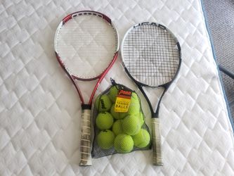A couple tennis rackets + a dozen tennis balls