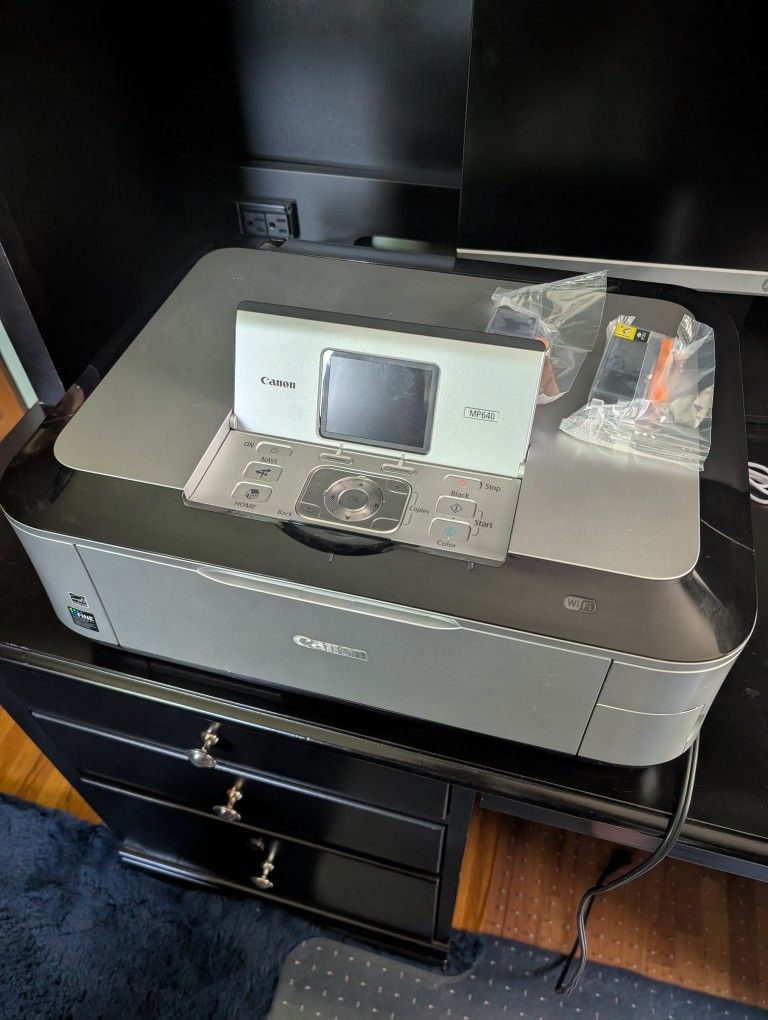 Canon Pixma MP640 Wireless Photo All-In-One Printer
2 Black cartridges included
Works great
Canon MP640
Highlights
Up To 9600 x 2400dpi Resolution
4