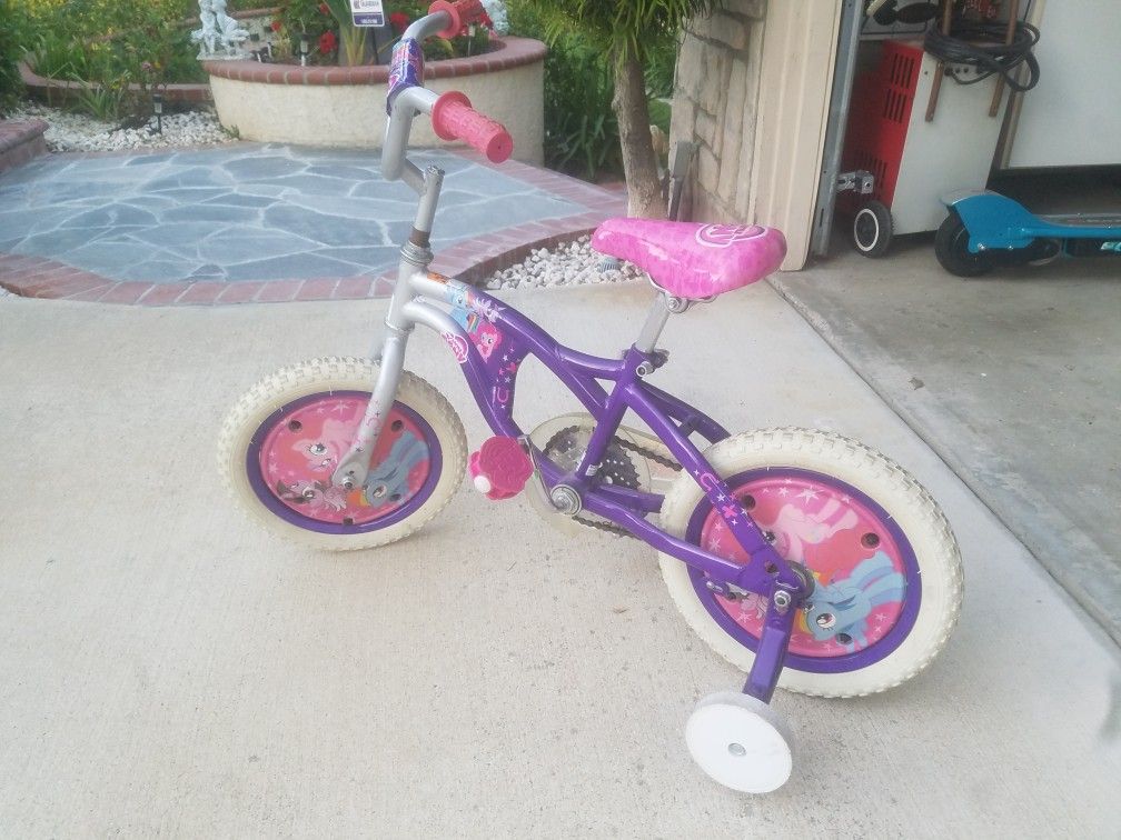 My Little Pony bicycle with training wheels and helmet