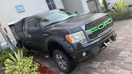 Ford F150 work truck with Camper
