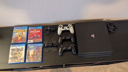 PS4 Pro w/ games & controllers