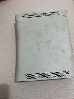 Xbox 360 original comes with charger and HD but no controller it has call of duty mw2 and Kinect adventures