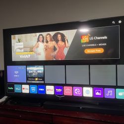 LG 70” 4k LED TV And soundbar With Subwoofer 300 Obo