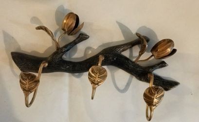ANTHROPOLOGIE BUDDING  BRANCH HOOK,includes three leaf-shaped hooks for hanging items and two elegant tulip-shaped buds at the top for aesthetic appea