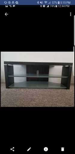TV stand with tempered glass shelves